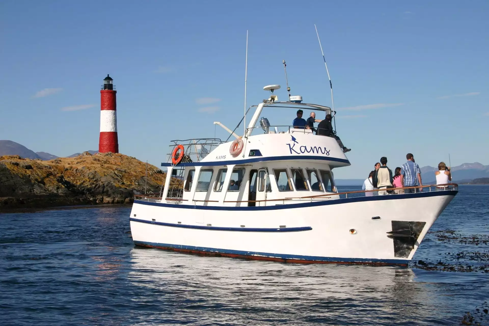 Beagle Channel Navigation. Lighthouse and Sea Lions – Yacht